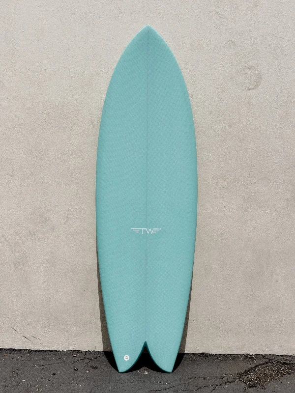 best surfboards for carving-Tyler Warren | 5’10” Dream Fish Clear Blue Surfboard