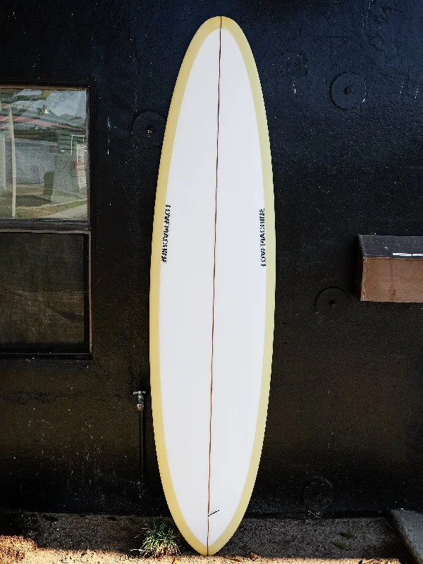 best surfboards for competition-Love Machine | v.Bowls 7’6” Ivory Clear Surfboard